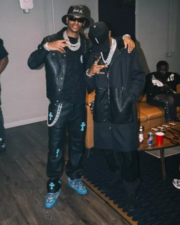 Chrome Hearts Black Nylon & Leather-Panel Carpenter Pants worn by A Boogie wit da Hoodie on the Instagram account @aboogievsartist