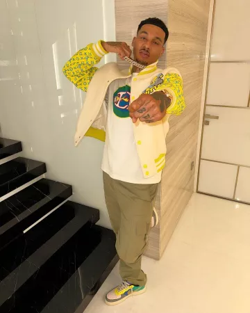 Louis Vuitton Khaki 'Signature' Cargo Pants worn by Fredo on the Instagram account @fredo