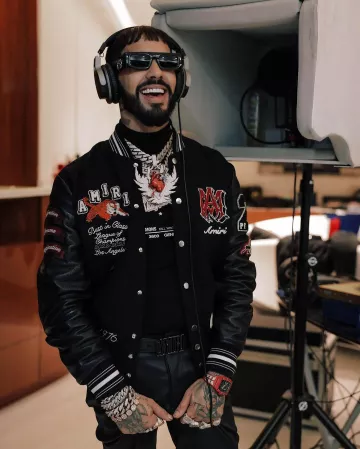Gucci Black Wide Rectangular Sunglasses (GG1646S) worn by Anuel AA on the Instagram account @anuel