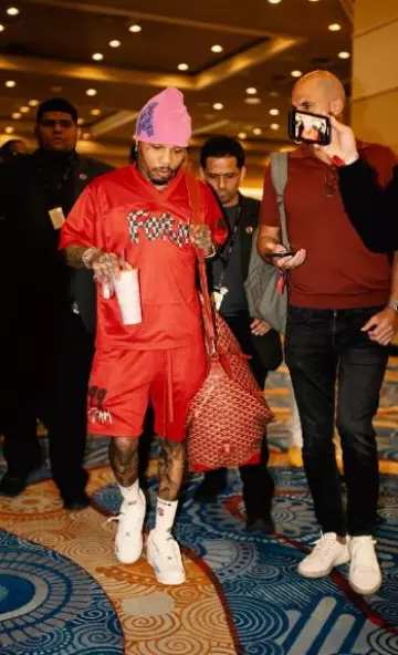 Sac Boeing 55 Goyard Rouge porté par Gervonta Davis sur le compte Instagram @gervontaa