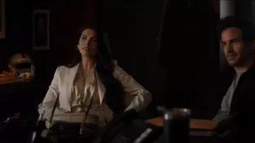The Sei Draped Bodysuit In Beige worn by Nadia Morales (Eva De Dominici) as seen in The Cleaning Lady (S03E09)