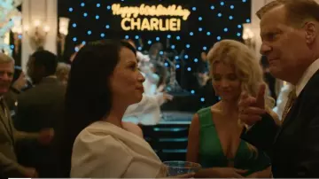 Safiyaa One Shoulder Top & Halluana Trousers worn by Joyce Newman (Lucy Liu) as seen in A Man in Full (S01E01)