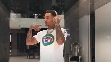 Audemars Piguet Rose Gold Skele­ton Roy­al Oak worn by Fredo in Fredo - Top G (Official Video)