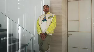 Louis Vuitton White & Yellow Monogram Sleeve Varsity Jacket worn by Fredo in Fredo - Top G (Official Video)
