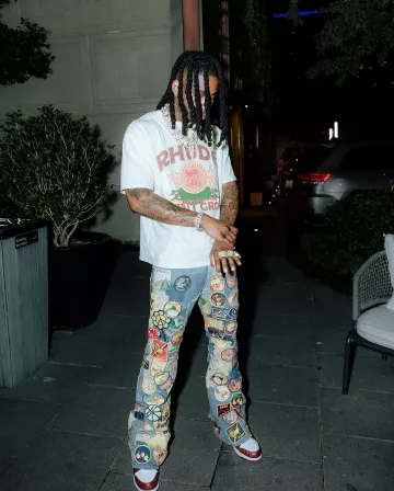 Kapital Blue Beautiful World Patch Flared Jeans worn by Polo G on the Instagram account @polo.capalot