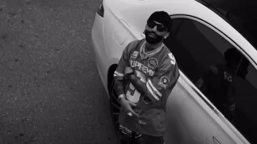 Supreme Red Patches #9 Football Jersey (FW23) worn by Arcángel in RYAN CASTRO, ARCANGEL - PUEBLO DE MEDALLO (Video Oficial)