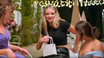 H&M Mi­ni Shoul­der Bag worn by Hannah Fouch as seen in Vanderpump Villa (S01E08)