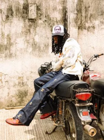 Louis Vuitton x Henry Taylor Deep Blue Portraits Flared Jeans worn by Kai Cenat on the Instagram account @kaicenat