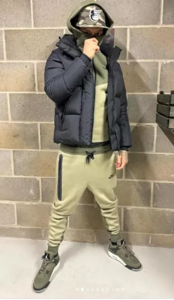 Nike Olive Green & Khaki 'Windrunner' Zip Hoodie worn by Central Cee on the Instagram account @centralcee