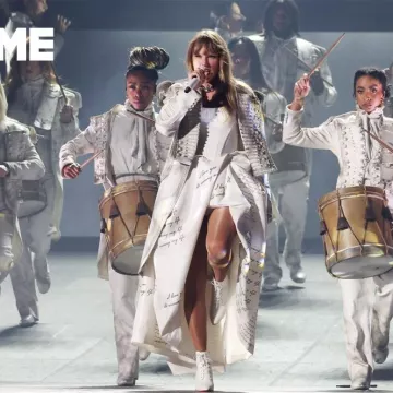 Taylor Swift outfits: White Fringe Coat worn by the artist during her Paris performance for Eras Tour 2024