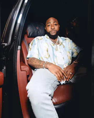 Givenchy Light Blue Peeled Lemons Print Shirt worn by Davido on the Instagram account @davido