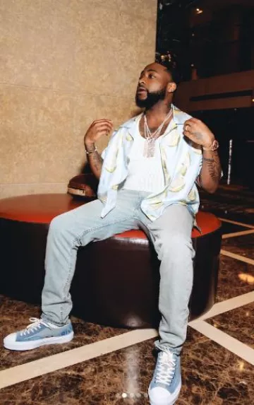 Givenchy Light Blue Canvas & Suede 'City' Sneakers worn by Davido on the Instagram account @davido