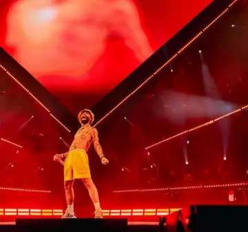 Short Kith x Columbia Yellow 'Wind' porté par Arcángel sur le compte Instagram @arcangel