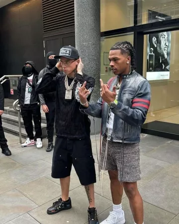 Eytys Navy & Red-Stripe Worn Biker Jacket worn by Lil Baby on the Instagram account @cbfw2040