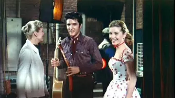 Loving You: Elvis Presley is wearing Checked Western Shirt to portray Deke Rivers in the movie from 1957