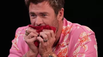 Hot Ones: Chris Hemsworth is wearing Pink Printed Shirt to face the peppers