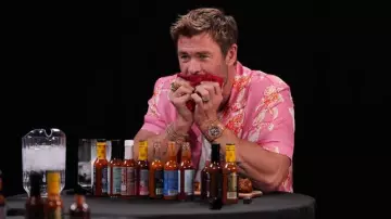 Hot Ones: Chris Hemsworth is wearing Pink Printed Shirt to face the peppers