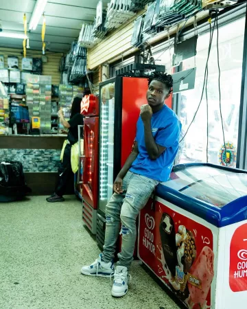 Amiri Antique Indigo & Blue Suede MX1 Jeans worn by Quando Rondo on the Instagram account @quando_rondo