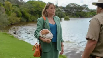 Deadly Ponies Orange Bag worn by Alexa Crowe (Lucy Lawless) as seen in My Life Is Murder (S04E05)