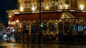 The Idea of You filming locations: Cafe Le Dôme in Paris, meeting place of Solène (Anne Hathaway) and Hayes (Nicholas Galitzine) in the romantic movie