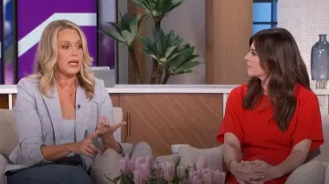 Victoria Beckham Pleated Cady Midi Dress worn by Casey Wilson as seen in The Talk on May 22, 2024