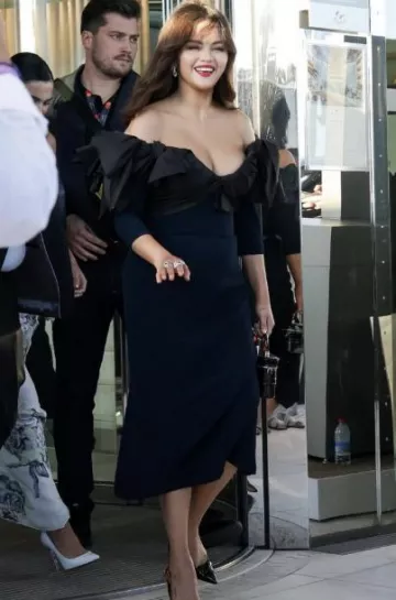 Roger Vivier Vanity Strass Buckle Micro Bag In Patent worn by Selena Gomez at Cannes on May 17, 2024