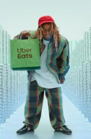 Vivienne Westwood Green Tartan Macca Pants worn by Lil Wayne on the Instagram account @ubereats