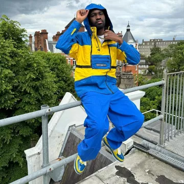 Dave Wardrobe: Supreme x The North Face Blue & Yellow Steep Tech Jacket worn by American Rapper on Instagram