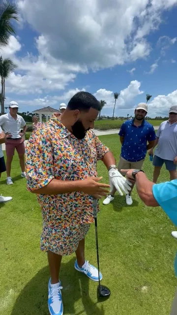 DJ khlaed's sneakers collection: Nike Jordan 1 Retro Low Golf UNC worn by him playing golf on Instagram post