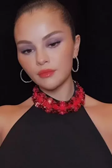 Suzanne Kalan Classic Diamond Midi Hoops worn by  Selena Gomez on her Instagram Post on May 14, 2024