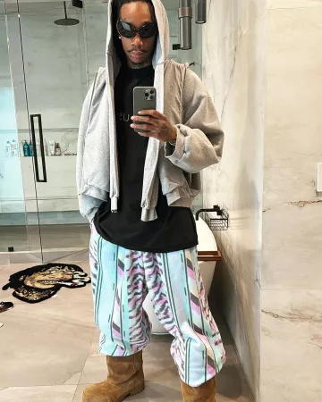 Balenciaga Grey Sleeved-Hood Zip Hoodie worn by Wiz Khalifa on the Instagram account @wizkhalifa