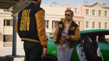 The Fall Guy Promotion: Ryan Gosling is wearing Movie Jacket Merchandise in Ryan Gosling & 'The Fall Guy' Stunt Team Do Carpool Karaoke video