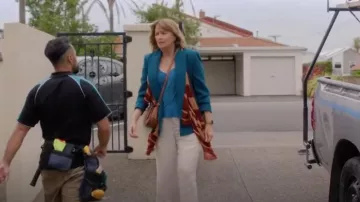 Oroton Margot Saddle Crossbody worn by Alexa Crowe (Lucy Lawless) as seen in My Life Is Murder (S04E07)