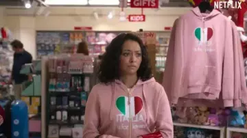 Love in the Villa movie outfits: Kat Graham is wearing 'Italia is for lovers' zip pink hoodie to play Julie Hutton