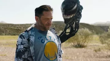 Outfits from Venom: The Last Dance Movie: Eddie Brock portrayed by Tom Hardy wears 'The City' T-Shirt