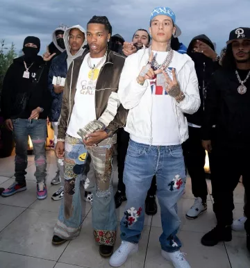 Kapital Blue Patchwork 'Crazy Botanical' Flared Jeans worn by Lil Baby on the Instagram account @lilbaby