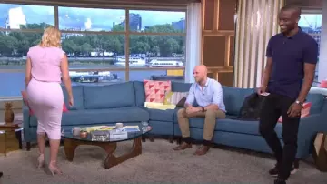 Holly Willoughby Outfits: Holly Willoughby is wearing a pink skirt in This Morning on July 12, 2016