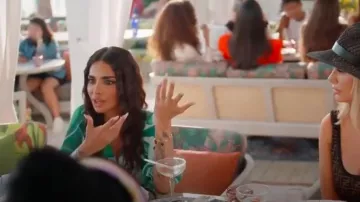 Van Cleef & Arpels Magic Alhambra Tiger's Eye And Red Carnelian Bracelet worn by Sara Al Madani as seen in The Real Housewives of Dubai (S02E01)