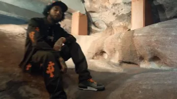 Chrome Hearts Camo & Orange Cross Patches 'CH' Hat worn by Key Glock in Key Glock - F**k Around & Find Out (Official Video)