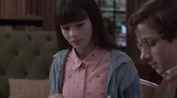 The dress shirt pink Violet Baudelaire in The Disastrous Adventures of the Orphans Baudelaire