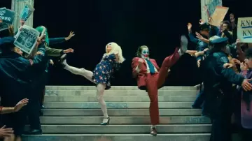 Jok­er: Folie à Deux Outfits: Lady Gaga is wearing Blue Printed Dress to play Harley Quinn in the movie