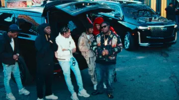 Jeans cargo tactiques gris tempête Amiri porté par Byron Messia dans Byron Messia, Lil Baby, Rvssian - Choppa (Clip officiel)