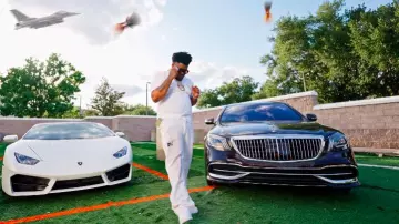 Gallery Dept. White Paint Splatter Flared Jeans worn by BossMan Dlow in BossMan Dlow - SportsCenter (Official Video)