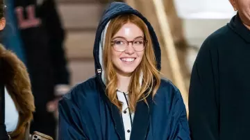 Syd­ney Sweeney Outfits: Blue Hooded Trench Coat worn by the actress seen on the set of Madame Web in Grand Central Station on October 11, 2022 in New York City