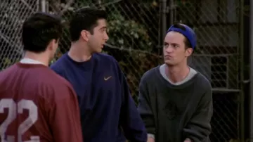 Clothing from Friends TV series: David Schwimmer is wearing Nike blue crewneck to portray Dr. Ross Geller in season 3, episode 9