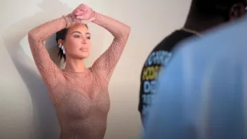 Skims Swarovski Stretch Net Long Sleeve Dress worn by Kim Kardashian as seen in The Kardashians (S05E04)