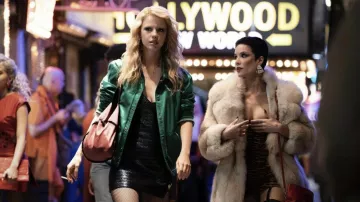 Clothing form MaXXXine: Green Satin Bomber Jacket worn by Maxine (Mia Goth) in the movie