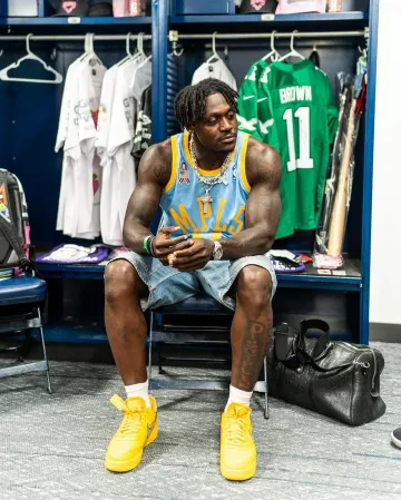 Kapital Blue Denim Studded Carpenter Shorts worn by AJ Brown on the Instagram account @blitzfits