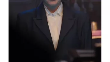 Outfits of Agatha All Along: Agatha Harkness (Kathryn Hahn) wears blue blazer jacket in season 1, episode 2 of the TV series