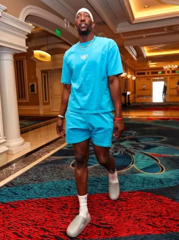 Nike Grey Rubber Calm Sandals worn by Bam Adebayo on the Instagram account @nbafashionfits